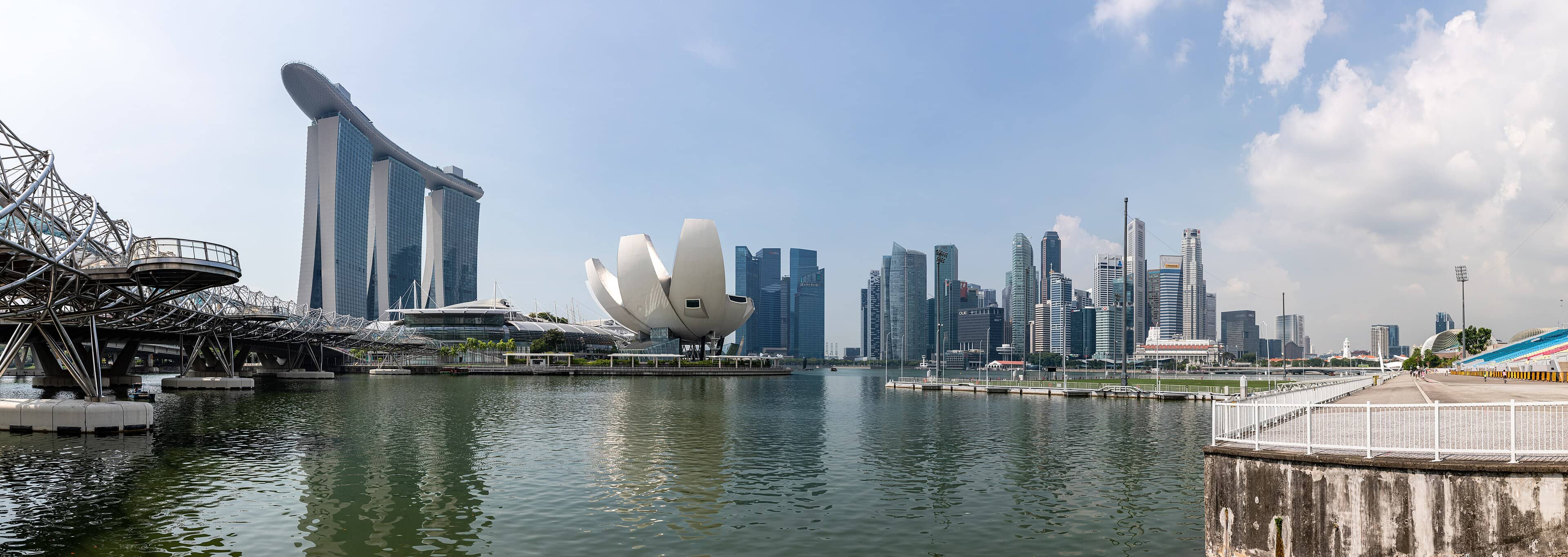 Marina Bay Sands, the ArtScience Museum and Singapore's skyline under bright blue skies